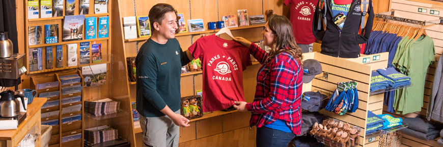 Two people in a gift shop.