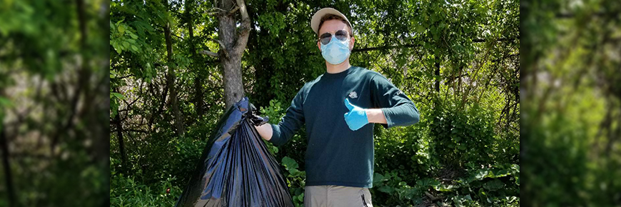 Staff picking up garbage. 