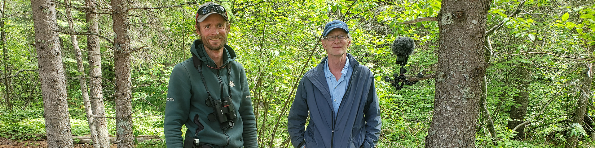 Chris Robinson and volunteer Ted Schintz setting up song meters in Pukaskwa National Park