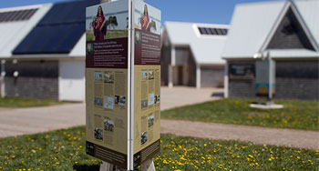 Tri-lingual sign at Cavendish Beach Complex