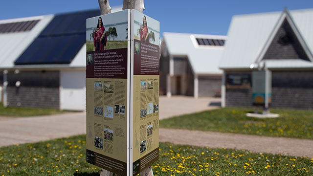 Tri-lingual sign at Cavendish Beach Complex