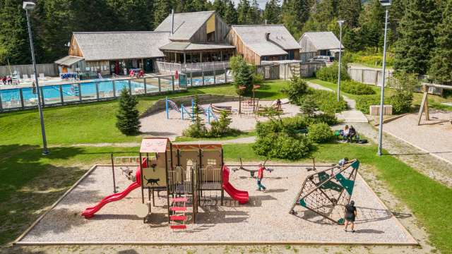 Aerial view of a playground with children playing. 