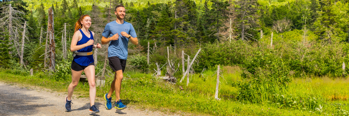 Two runners on a trail