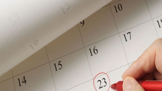 Calendar with a date in a red circle.