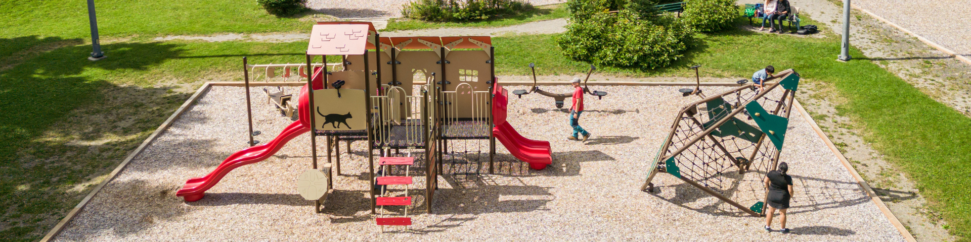 Aerial view of a playground with kids playing. 