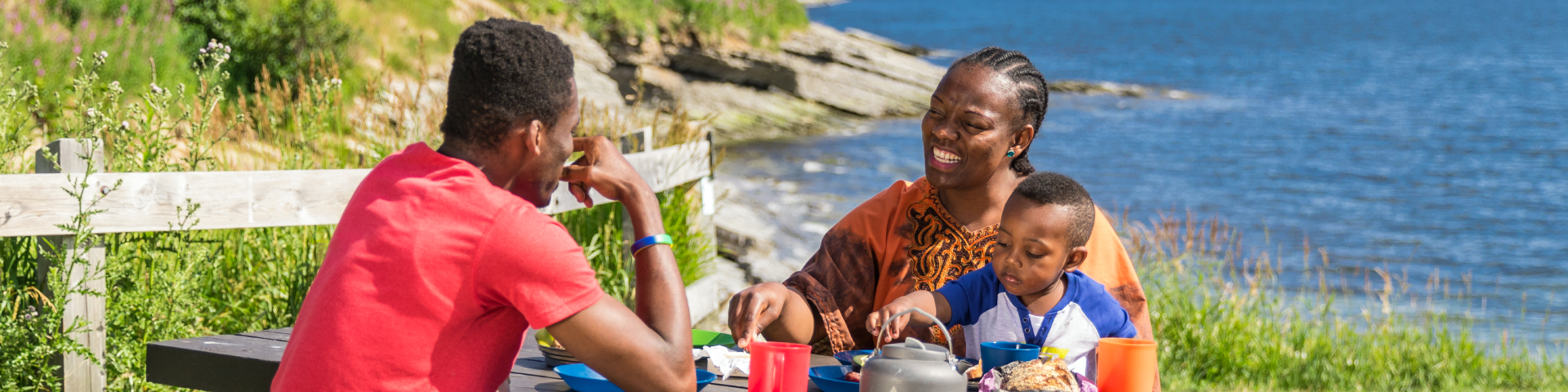  A family picnic on a pebble beach