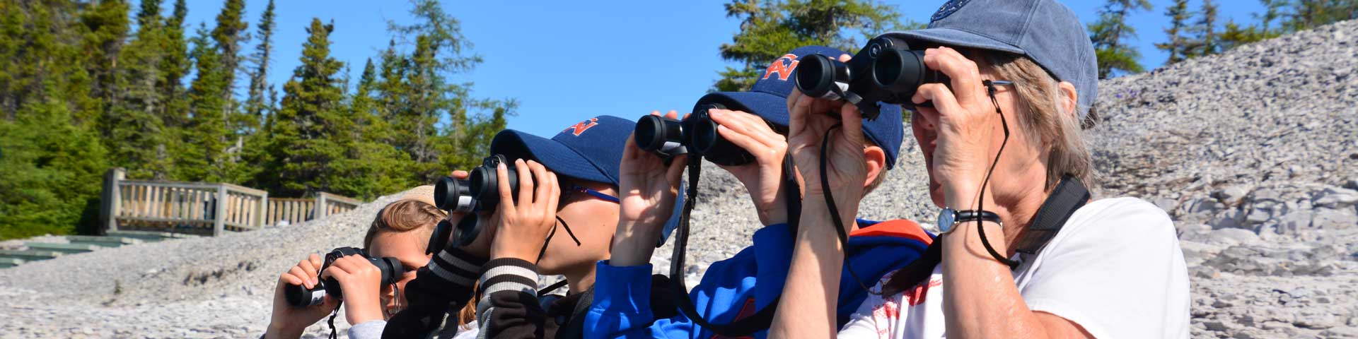 A group making observations with binoculars