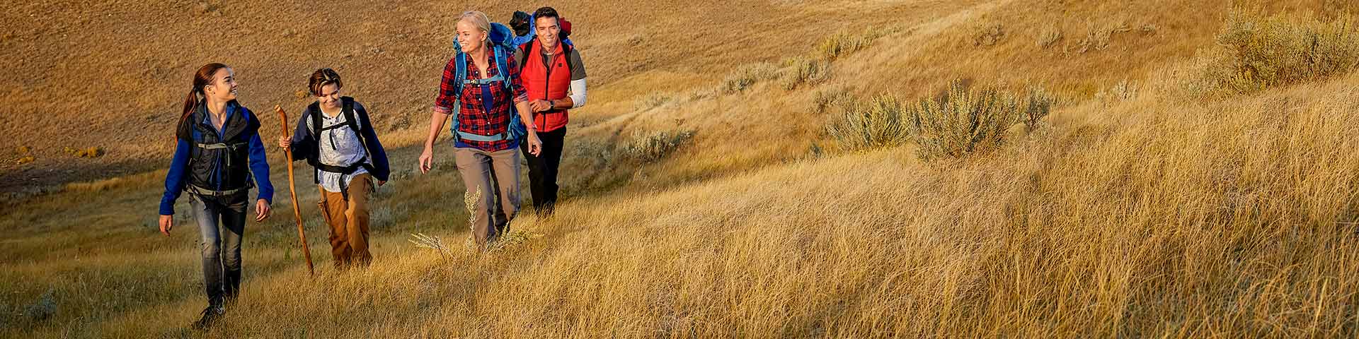 group of visitors on a hike in the West Block of Grasslands National Park