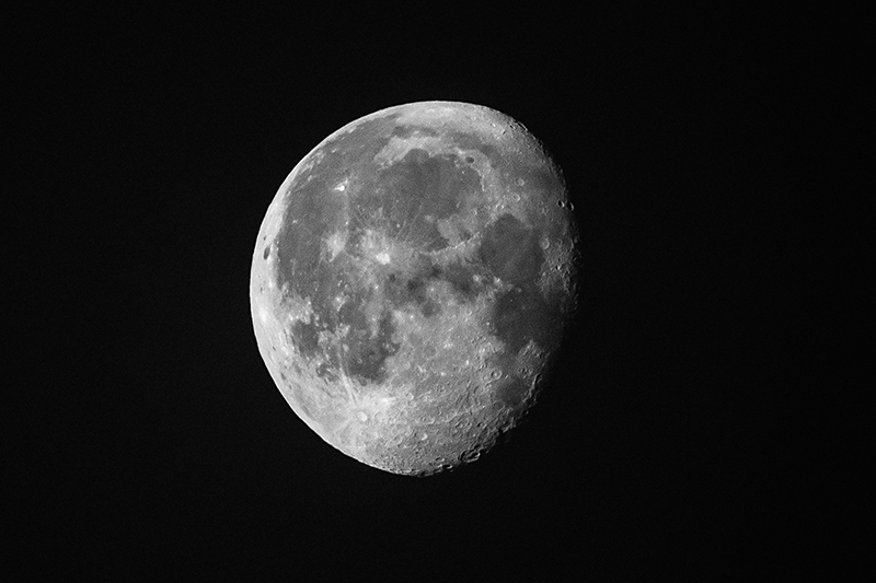 A detailed image of the moon against a solid black sky. 