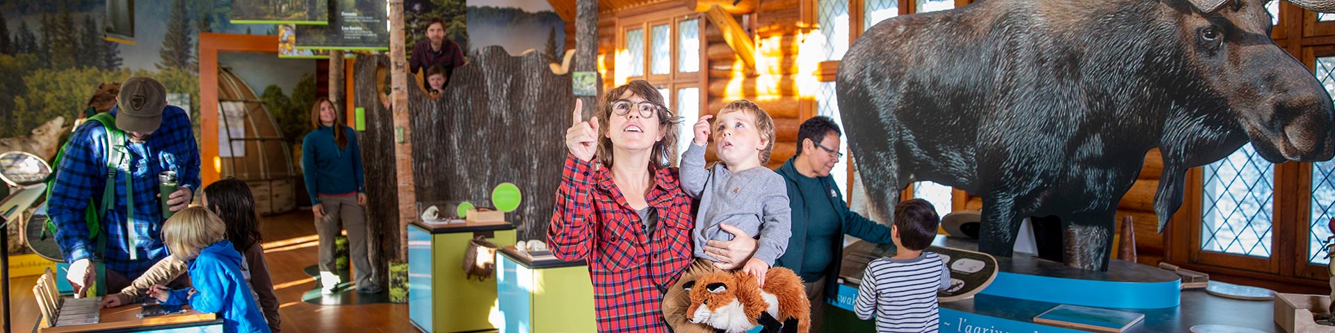 Visitors explore the Parks Canada Nature Centre in Waskesiu in Prince Albert National Park.