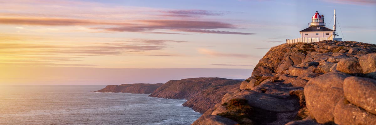 Aerial view of Cape Spear Lighthouse National Historic Site at sunrise.