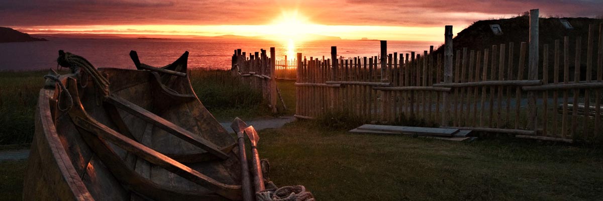 Sunset over the sea and the L'Anse aux Meadows National Historic Site.
