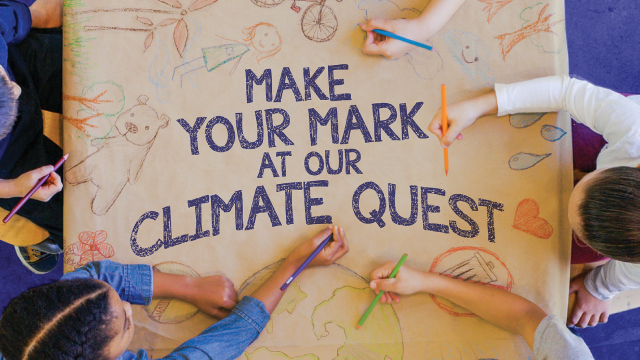 Children drawing on the poster for the ‘Our climate quest’ exhibition.