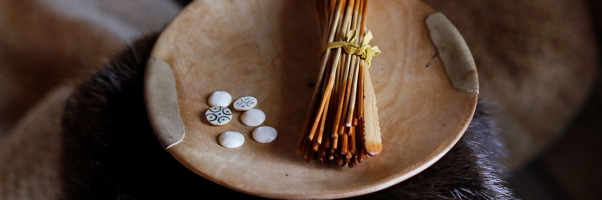 Waltes game pieces made of bone and wood.