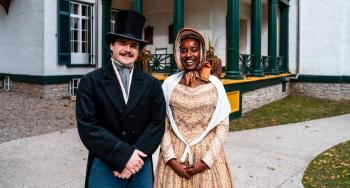 Guides in historic costume in front of Bellevue House.